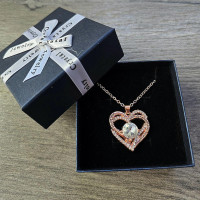 Женское золотое ожерелье с белым циркониевым сердечком Женское золотое ожерелье с белым циркониевым сердечком